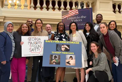 Goup of doctors posing with lawmakers at the capitol in support of the Pediatric Health Safe Storage Act