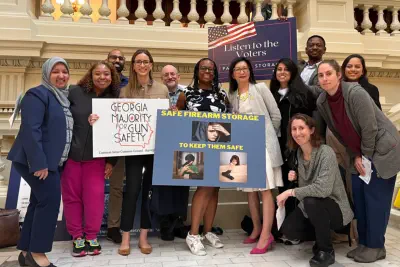 Goup of doctors posing with lawmakers at the capitol in support of the Pediatric Health Safe Storage Act