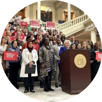 A large group of gun safety supporters rally at the capitol