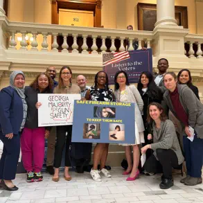 Georgia Majority for Gun Safety members pose at the Capitol with lawmakers supporting gun violence legilsation